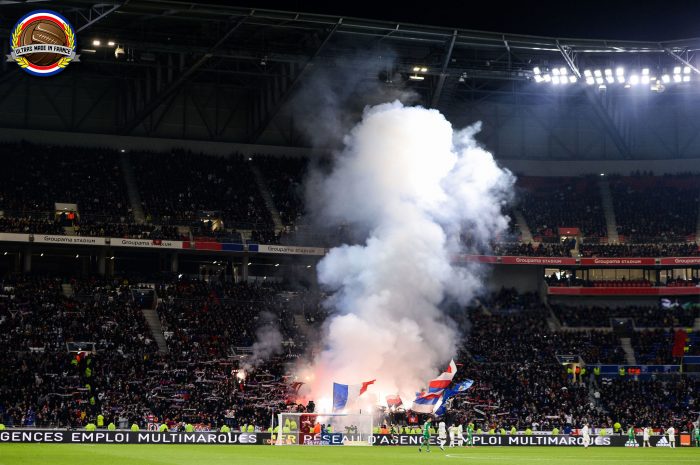 Fans of Lyon light up some flares during the French Ligue 1 Soccer match between Lyon and Saint-Etienne at Groupama Stadium on March 1, 2020 in Lyon, France. (Photo by Baptiste Fernandez/Icon Sport via Getty Images)
